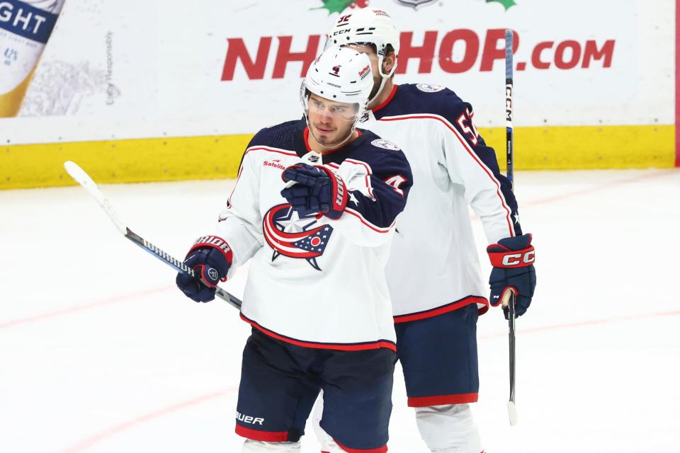 Columbus Blue Jackets center Cole Sillinger (4) celebrates his goal against the Buffalo Sabres during the third period of an NHL hockey game Tuesday, Dec. 19, 2023, in Buffalo, N.Y. (AP Photo/Jeffrey T. Barnes)