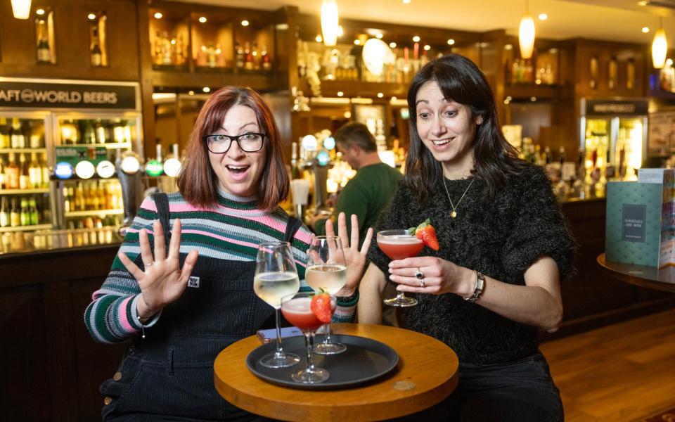 Rosa Silverman (right) photographed with her friend Emma for The Telegraph at the Alfred Herring Wetherspoons pub in Palmers Green, London