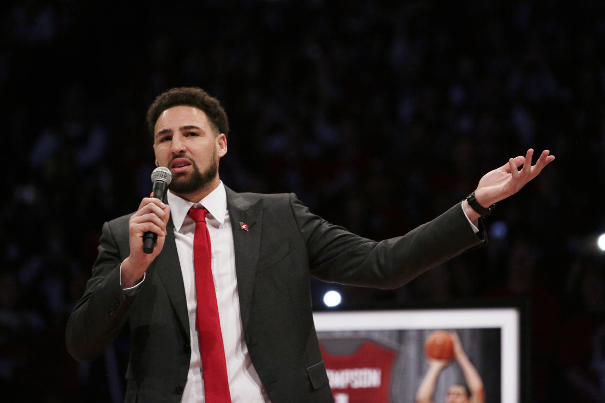 Golden State Warriors and former Washington State guard Klay Thompson speaks as the school retires his jersey number during halftime of an NCAA college basketball game between Washington State and Oregon State in Pullman, Wash., Saturday, Jan. 18, 2020. (AP Photo/Young Kwak)