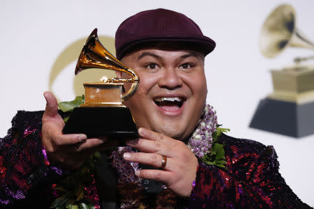 61st Grammy Awards - Photo Room - Los Angeles, California, U.S., February 10, 2019 - Kalani Pe'a reacts after winning Best Regional Roots Music Album for "No 'Ane'I". REUTERS/Mario Anzuoni