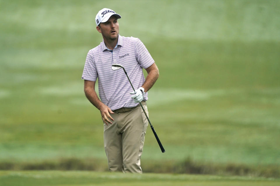 Russell Henley reacts to his chip shot on the 18th hole during the second round of the Wyndham Championship golf tournament in Greensboro, N.C., Friday, Aug. 4, 2023. (AP Photo/Chuck Burton)