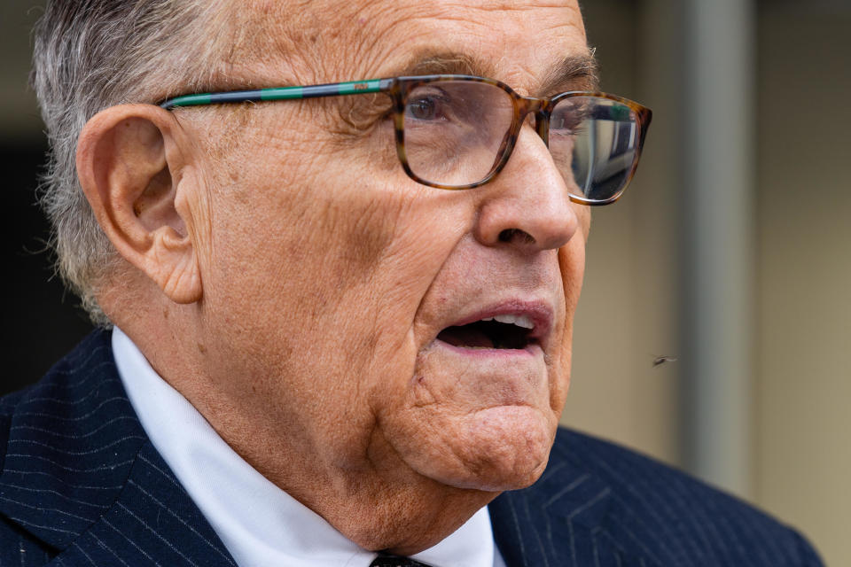 Rudy Giuliani speaks to members of the media while leaving federal court in Washington, D.C., May 19, 2023. / Credit: Eric Lee/Bloomberg via Getty Images