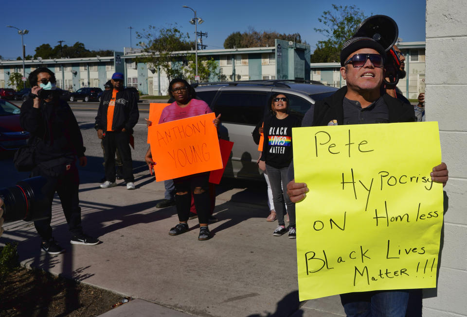 Activists with Black Lives Matter protest Pete Buttigieg's visit to a Bridge Home Project homeless shelter in Los Angeles on Jan. 10, 2020. (Photo: Richard Vogel/ASSOCIATED PRESS)