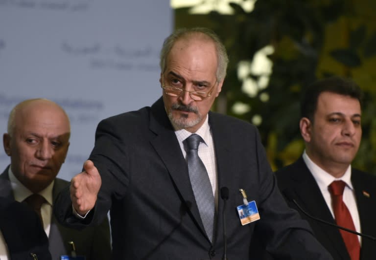 Syrian chief negotiator Bashar al-Jaafari (C), Ambassador of the Permanent Representative Mission of Syria to UN New York, speaks at a press conference on the Intra-Syria peace talks at the Palais des Nations in Geneva on March 2, 2017