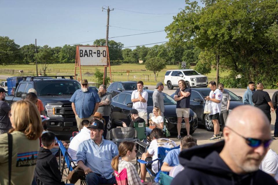 Hundreds of folks wait in line just 20 minutes before opening at Goldee’s Barbecue for hours before opening in Fort Worth on Saturday, April 22, 2023.