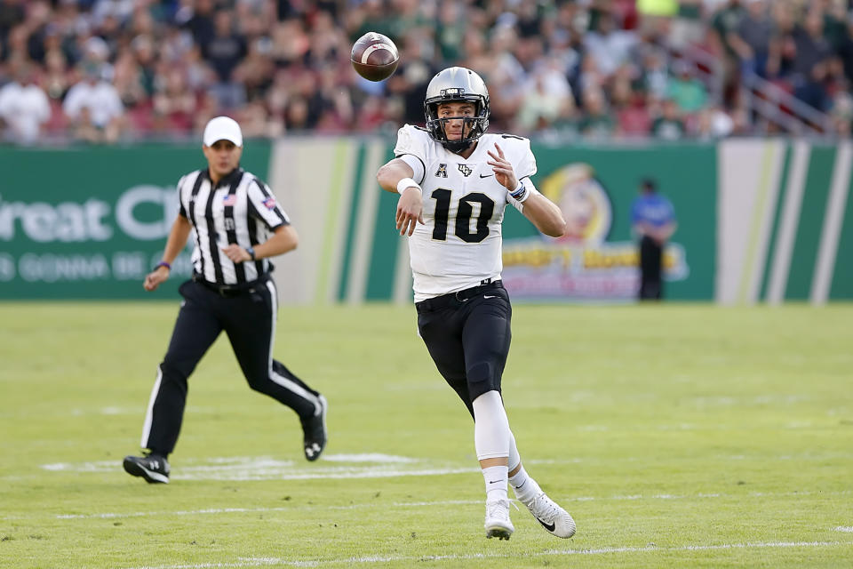 TAMPA, FL - NOVEMBER 03: UCF quarterback McKenzie Milton (10) throws the ball down field during the College Football game between the UCF Knights and the South Florida Bulls on November 23, 2018 at Raymond James Stadium in Tampa, FL. (Photo by Cliff Welch/Icon Sportswire via Getty Images)