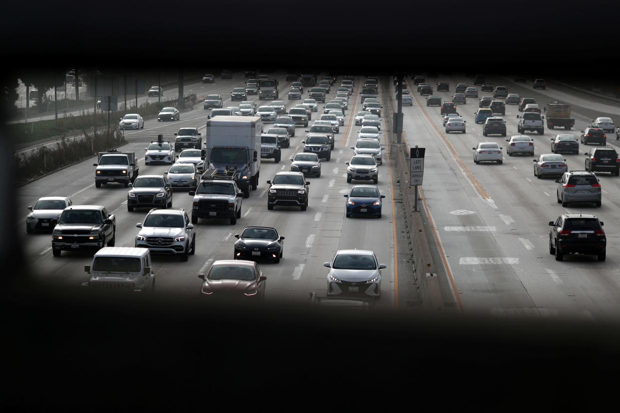 FILE PHOTO: Morning traffic drives on the 405 freeway in Los Angeles, California, U.S., November 12, 2019. REUTERS/Lucy Nicholson/File Photo