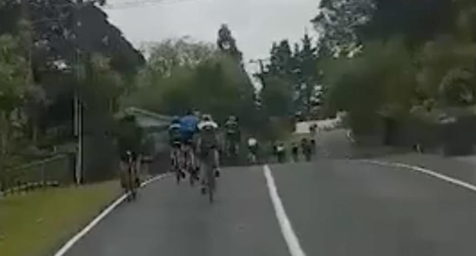 A large pack of over 10 cyclists can be seen hogging the road in western Auckland on Sunday morning. Source: Nikki Bessem