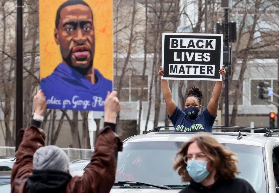 People react after the verdict was read in the Derek Chauvin trial on April 20, 2021 In Minneapolis.