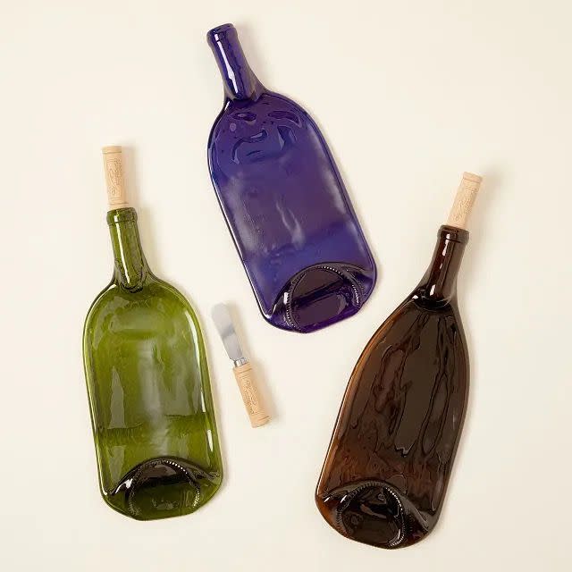 <p><a href="https://go.redirectingat.com?id=74968X1596630&url=https%3A%2F%2Fwww.uncommongoods.com%2Fproduct%2Frecycled-wine-bottle-platter-with-spreader&sref=https%3A%2F%2Fwww.womansday.com%2Flife%2Fg60458418%2Fbest-eco-friendly-sustainable-gifts%2F" rel="nofollow noopener" target="_blank" data-ylk="slk:Shop Now;elm:context_link;itc:0;sec:content-canvas" class="link ">Shop Now</a></p><p>Recycled Wine Bottle Platter with Spreader</p><p>$24.00</p>