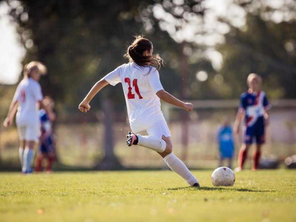 people playing soccer