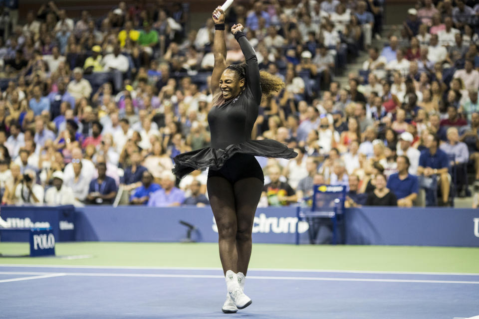 Serena Williams celebrates her victory with a twirl during her match against Karolina Pliskova in the women's singles quarterfinals match during the U.S. Open on Sept. 4, 2018, in Flushing, N.Y. (Tim Clayton / Corbis via Getty Images file)