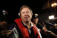 The head of the parbuckling project Nick Sloane talks with reporters at the end of the "parbuckling" operation at the Giglio harbour September 17, 2013. Salvage crews completed raising the wreck of the Costa Concordia in the early hours of Tuesday morning after a 19-hour-long operation on the Italian island of Giglio where the huge cruise liner capsized in January last year. REUTERS/Tony Gentile (ITALY - Tags: DISASTER MARITIME)