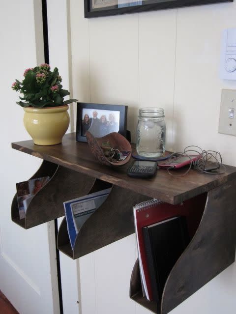 <p>Don't let your bills and thank you notes take over your dining room table. This nifty floating shelf made out of magazine holders from IKEA features three different cubbies - one for unopened mail, action items and letters to hold onto for later. </p><p><a rel="nofollow noopener" href="http://www.instructables.com/id/IKEA-Hack-Mail-Rack/" target="_blank" data-ylk="slk:See more at Instructables »;elm:context_link;itc:0;sec:content-canvas" class="link "><em>See more at Instructables »</em></a></p>