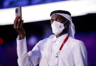 <p>An athlete from Team Qatar is seen during the Opening Ceremony of the Tokyo 2020 Olympic Games. (Photo by Hannah McKay - Pool/Getty Images)</p> 