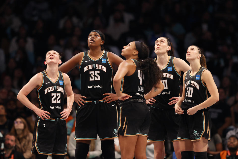 The New York Liberty's Courtney Vandersloot (L), Jonquel Jones, Betnijah Laney, Breanna Stewart and Sabrina Ionescu look on in the second quarter of Game 4 of the WNBA Finals on Wednesday at Barclays Center. (Photo by Sarah Stier/Getty Images)