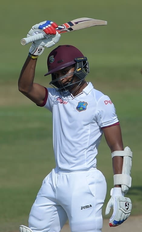 West Indies batsman Shane Dowrich celebrates reaching his 50 in the third Test against Pakistan in Sharjah on November 3, 2016