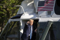 President Donald Trump points as he departs the White House on Marine One, Friday, May 15, 2020, in Washington. Trump is en route to Camp David, Md. (AP Photo/Alex Brandon)