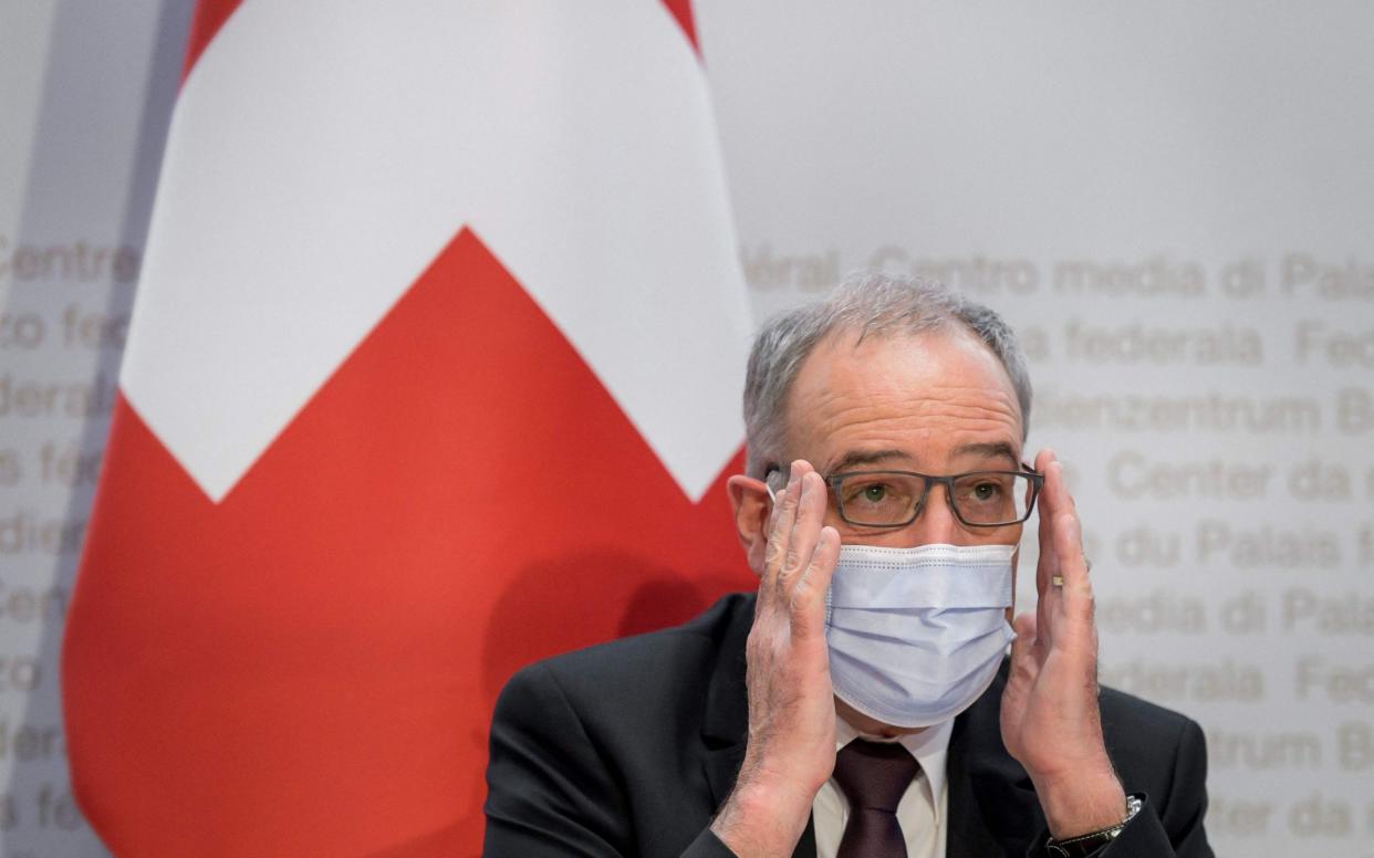 Swiss President Guy Parmelin reacts as he attends a press conference on a long-delayed Swiss-EU framework deal on May 26, 2021 - FABRICE COFFRINI/ AFP