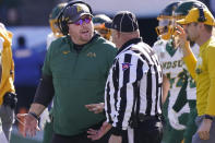 CORRECTS TO NORTH DAKOTA STATE NOT NORTH DAKOTA - North Dakota State head coach Matt Entz, left, speaks to an official during the first half of the FCS Championship NCAA college football game against the South Dakota State, Sunday, Jan. 8, 2023, in Frisco, Texas. (AP Photo/LM Otero)