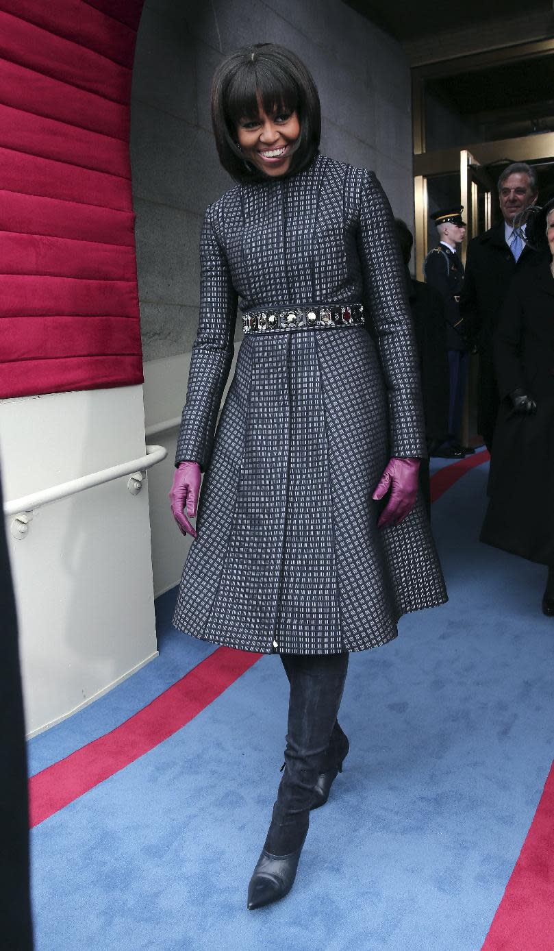 First lady Micehlle Obama arrives on the West Front of the Capitol in Washington, Monday, Jan. 21, 2013, for the Presidential Barack Obama's ceremonial swearing-in ceremony during the 57th Presidential Inauguration. (AP Photo/Win McNamee, Pool)