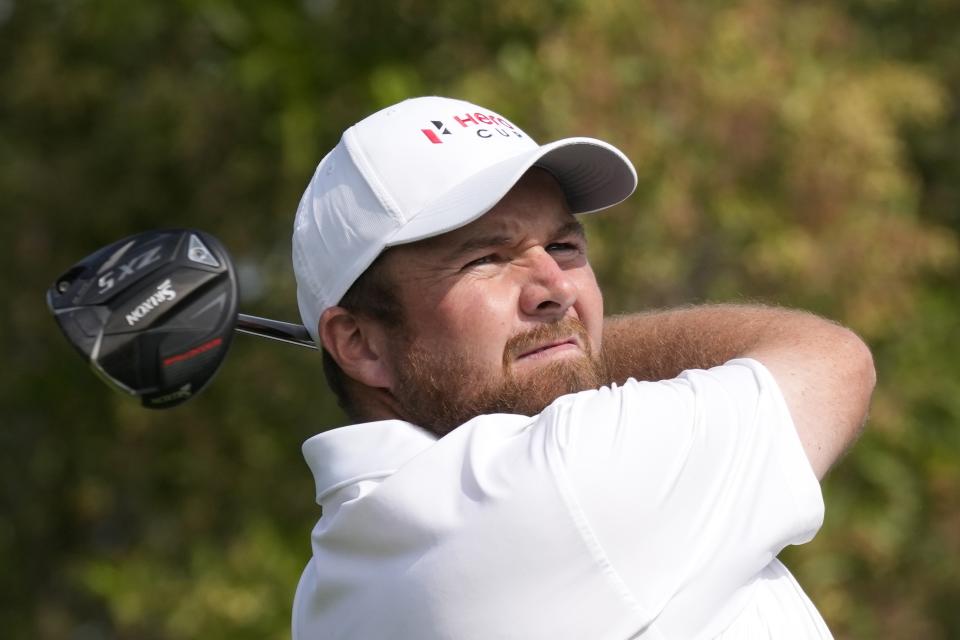 Shane Lowry of Great Britain and Ireland, tees off on the third hole during the Fourball matches of the Hero Cup at Abu Dhabi Golf Club, in Abu Dhabi, United Arab Emirates, Friday, Jan. 13, 2023. (AP Photo/Kamran Jebreili)
