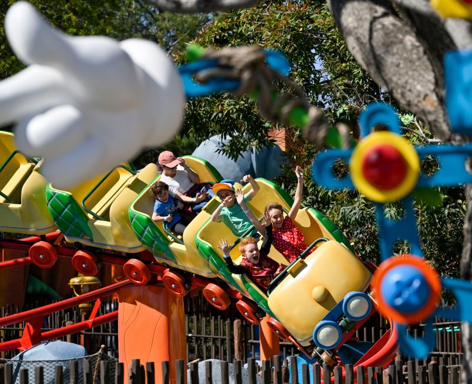 Visitors to Mickey's Toontown ride Chip n' Dale's GADGETcoaster inside Disneyland Park in Anaheim, CA, on Saturday, March 18, 2023.