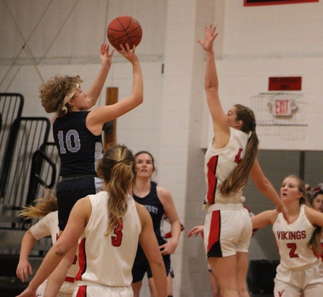 Frankfort's Larae Grove elevates for a shot in traffic. Grove scored 14 points for the Lady Falcons in their 57-51 loss at Petersburg.