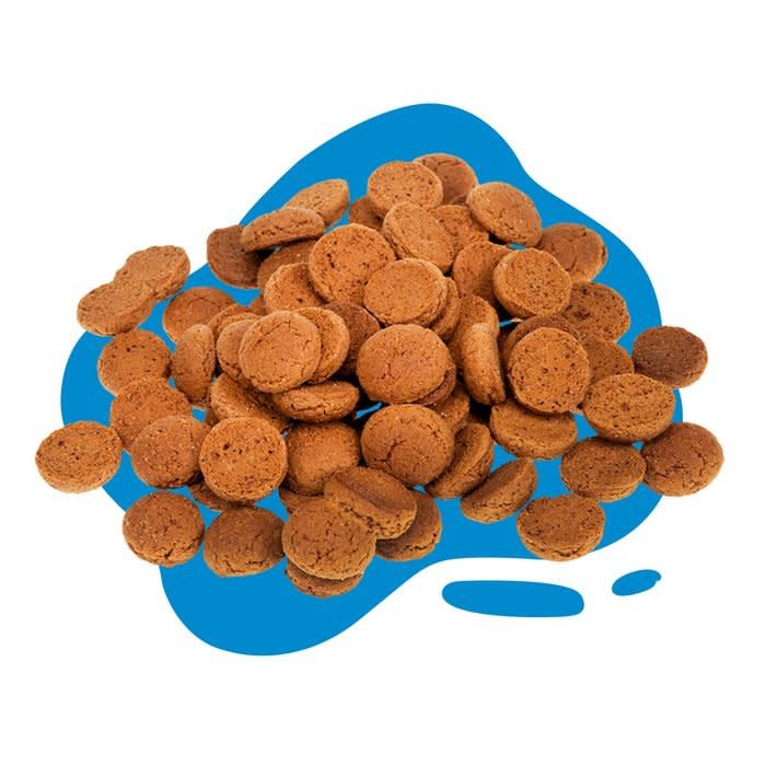 pile of pepernoten ( Pfeffernuesse) on blue blob background