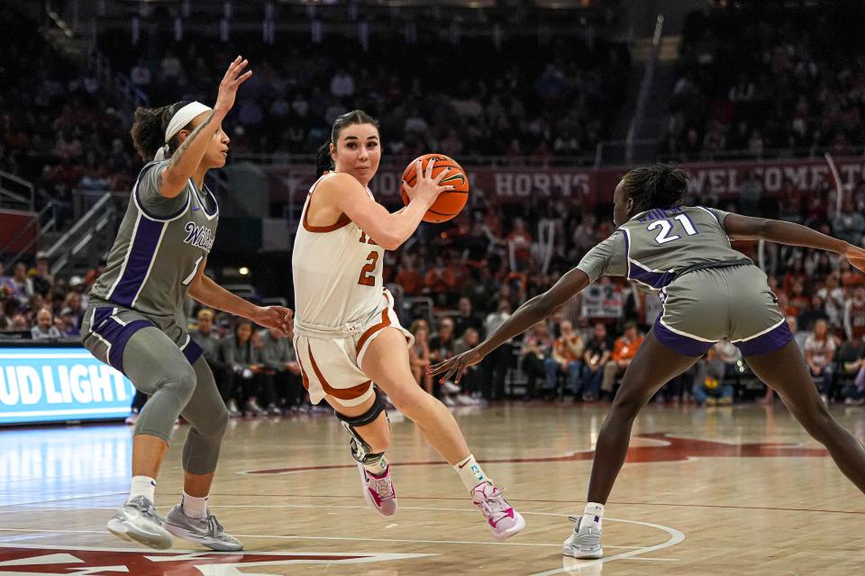 Texas guard Shaylee Gonzales pushes past Kansas State guard Zyanna Walker during the Longhorns' 61-54 win Feb. 4.