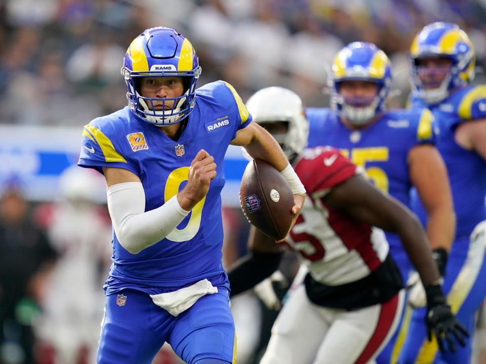 Matthew Stafford makes a play against the Arizona Cardinals.