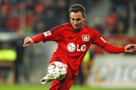 File photo of Bayer Leverkusen's Josip Drmic as he scores a goal against FC Cologne during the Bundesliga first division soccer match in Leverkusen November 29, 2014. REUTERS/Ina Fassbender