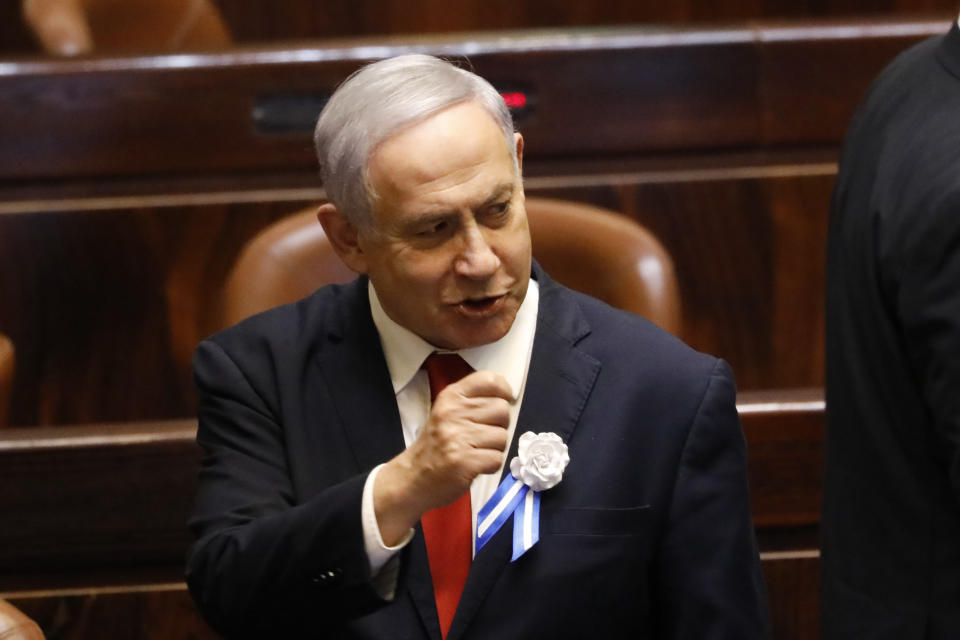 Israeli Prime Minister Benjamin Netanyahu attends the swearing-in of the new Israel's parliament in Jerusalem, Thursday., Oct. 3, 2019. (AP Photo/Ariel Schalit)