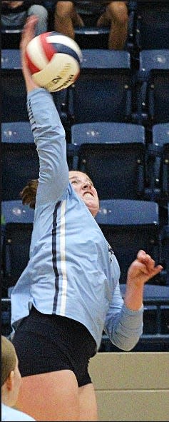 Bartlesville High School senior hitter Kelsey Ward puts a swing on the ball during a home victory on Aug. 31, 2023, against Glenpool High School.