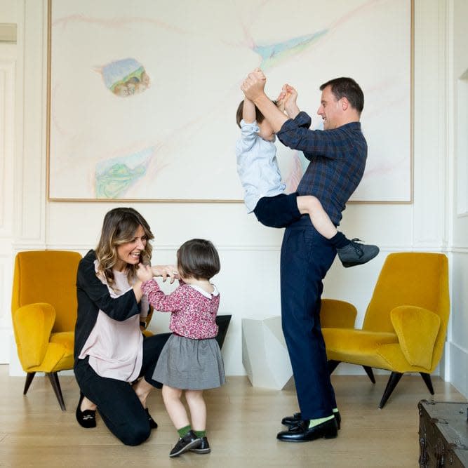 Achille Salvagni with his wife, Valentina, and children, Victoria and Gaetano, in their apartment  - Manuela Giusto 