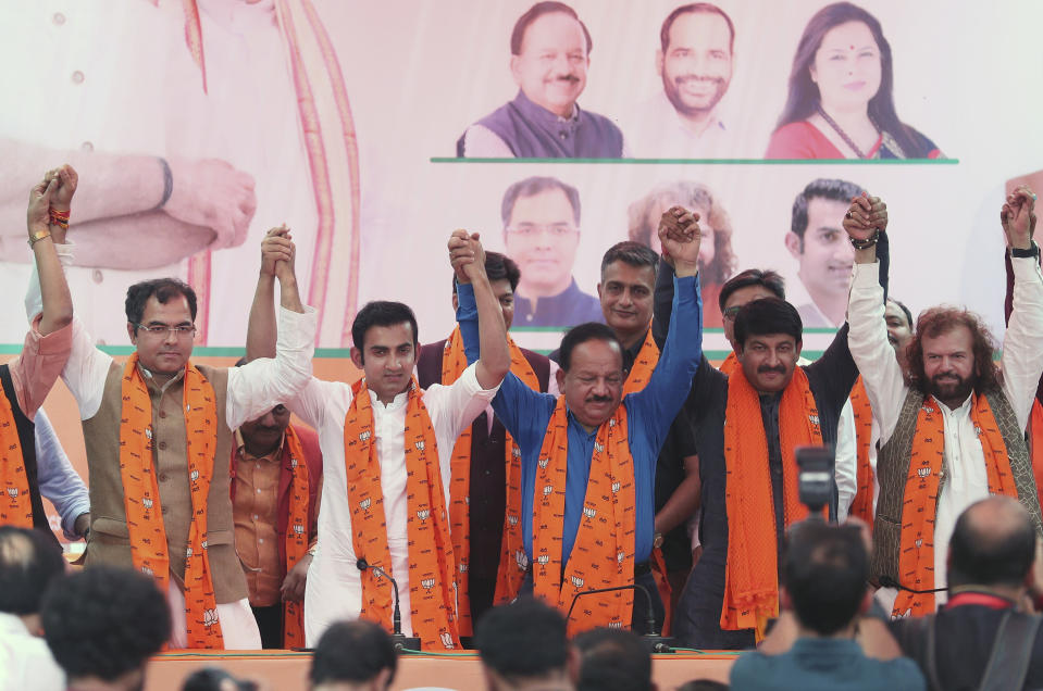 Newly elected lawmakers from India's ruling Bharatiya Janata Party, from left, Parvesh Singh Verma, Gautam Gambhir, Harsh Vardhan, Manoj Tiwari and Hans Raj Hans attend a press conference in New Delhi, India, Saturday, May 25, 2019. The Election Commission announced that the BJP won 303 out of 542 seats in the Lok Sabha, the lower house of Parliament, after the official vote count finished Friday. That is well beyond the simple majority a party in India needs to form a government. (AP Photo/Altaf Qadri)