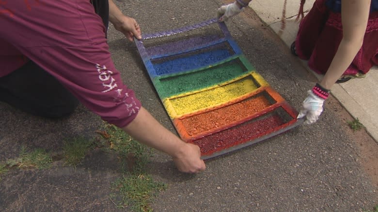 Summerside couple paints Pride rainbows on doorsteps, driveways, entrances for free