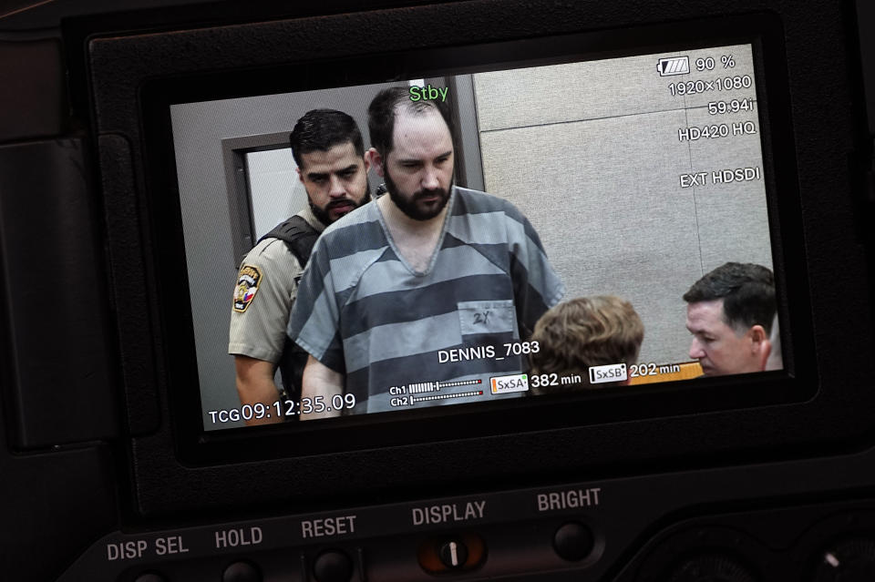 U.S. Army Sgt. Daniel Perry, who was convicted of murder for fatally shooting an armed protester in 2020 during nationwide protests against police violence and racial injustice, is seen on a pool video feed as he arrives for his sentencing hearing in Austin, Texas, Tuesday, May 9, 2023. (AP Photo/Eric Gay)