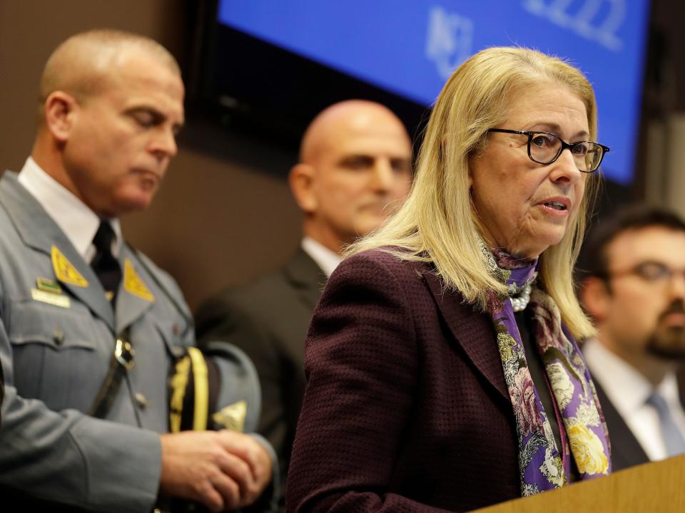 New Jersey Health Commissioner Judith Persichilli, second from right, takes questions during a news conference in Ewing, N.J., Monday, March 2, 2020.