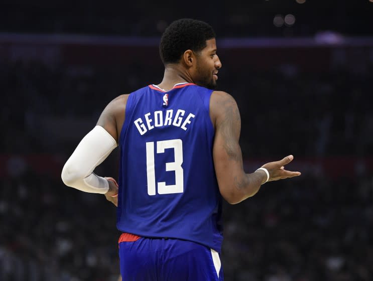 Los Angeles Clippers forward Paul George reacts to the sidelines during the second half of an NBA basketball game against the Atlanta Hawks in Los Angeles, Saturday, Nov. 16, 2019. The Clippers won 150-101. (AP Photo/Kelvin Kuo)