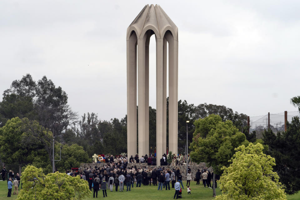 Members of the Armenian- American community join religious leaders at a religious ceremony remembering the victims of the Armenian Genocide at the Montebello Armenian Genocide Monument in Montebello, Calif., Saturday, April 24, 2021. The United States is formally recognizing that the systematic killing and deportation of hundreds of thousands of Armenians by Ottoman Empire forces in the early 20th century was "genocide" as President Joe Biden used that precise word that the White House has avoided for decades for fear of alienating ally Turkey. (AP Photo/Damian Dovarganes)