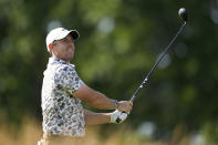 Rory McIlroy, of Northern Ireland, watches his shot on the 10th hole during the first round of the U.S. Open golf tournament at The Country Club, Thursday, June 16, 2022, in Brookline, Mass. (AP Photo/Julio Cortez)