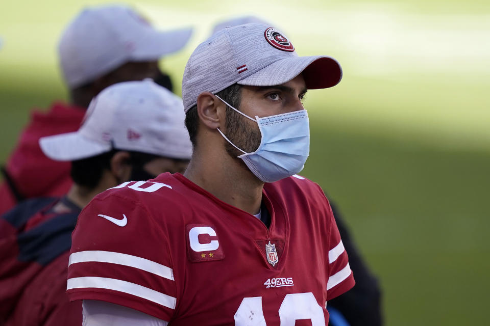 San Francisco 49ers quarterback Jimmy Garoppolo watches from the sideline during the second half of an NFL football game against the Miami Dolphins in Santa Clara, Calif., Sunday, Oct. 11, 2020. (AP Photo/Tony Avelar)