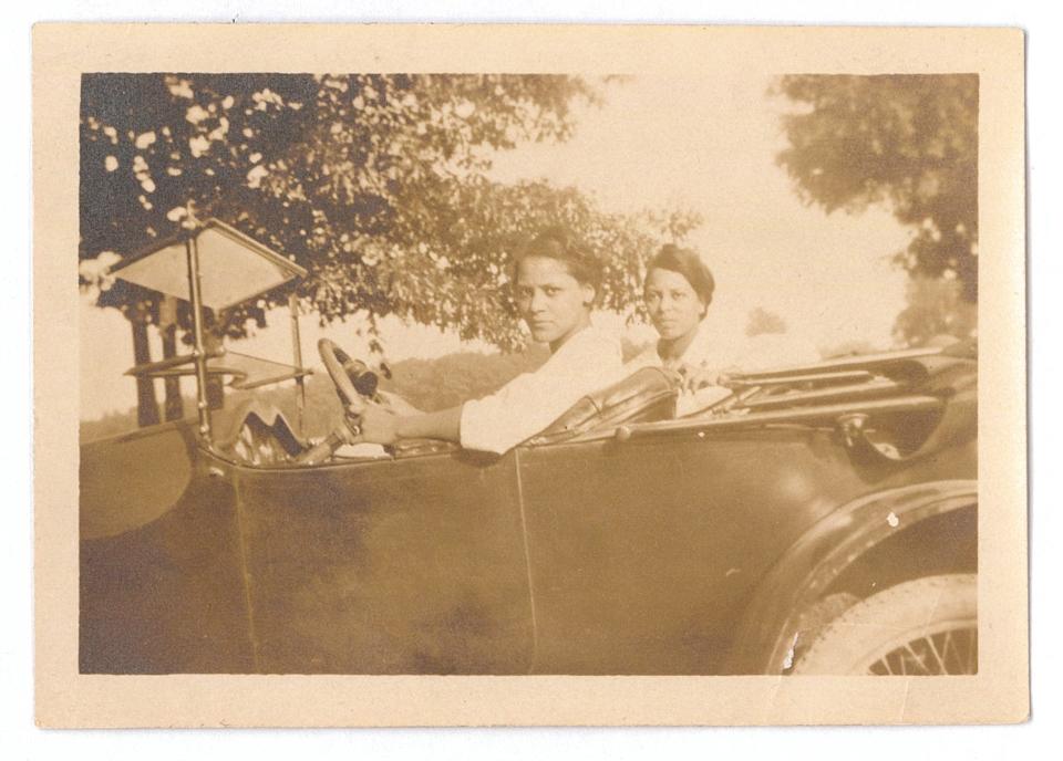 Amaza Lee Meredith, behind the wheel, circa1920