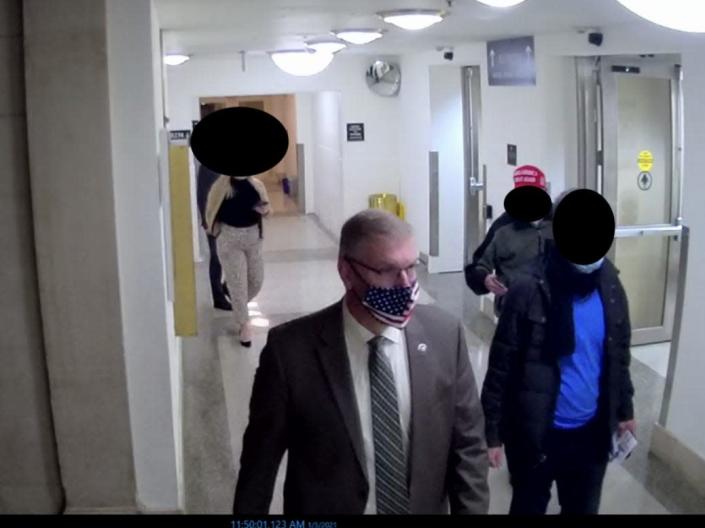 Video released by the January 6 committee shows Republican Rep. Barry Loudermilk of Georgia leading a tour through the Capitol complex on January 5, 2021.