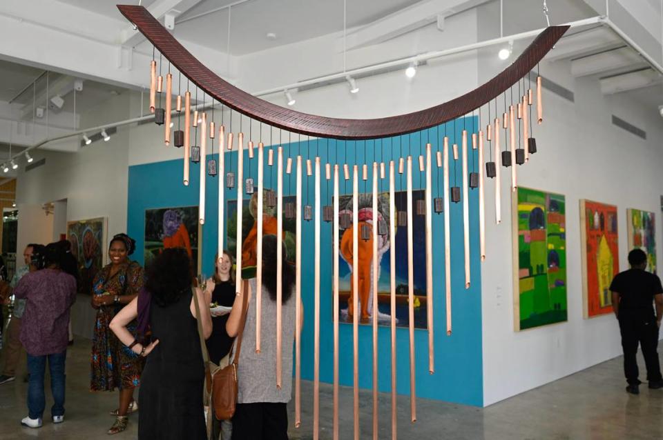 “Lift Every Voice” by artist Autumn T. Thomas on display at “Depth of Identity: Art as Memory and Archive” at Green Space Miami. The names of Black Americans who were killed by police are etched into the windchime.