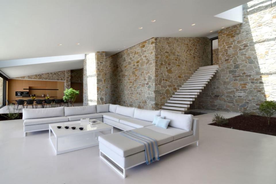<div class="inline-image__caption"><blockquote>Milos comes by its nickname the “Island of Colors” honestly, so it was a smart design decision to fill the interior of Gaia with soothing neutrals. You wouldn’t want to compete with paradise. </blockquote></div> <div class="inline-image__credit">Sotheby's Realty</div>