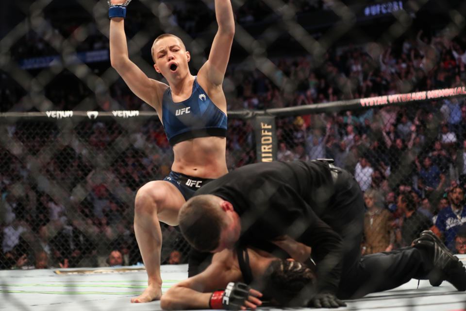 JACKSONVILLE, FL - APRIL 24: Rose Namajunas of the United States celebrates after beating Zhang Weili of China during the Women's Strawweight Title bout of UFC 261 at VyStar Veterans Memorial Arena on April 24, 2021 in Jacksonville, Florida.  (Photo by Alex Menendez/Getty Images)