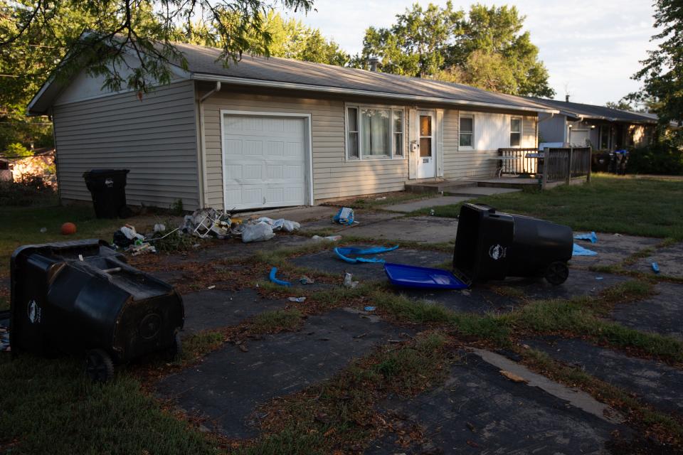 Garbage could be seen strewn Wednesday evening across the driveway of a house in the block of 2200 S.E. Market, the home of Holly Jo Felix, the mother of 5-year-old Topeka homicide victim Zoey Felix.