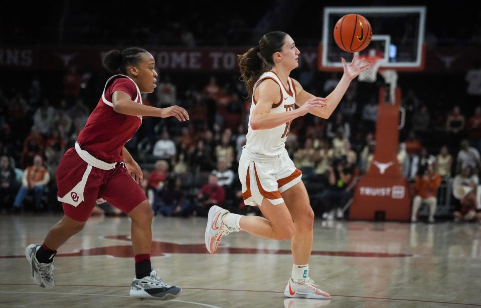 Longhorns guard Shay Holle gets control of the ball as Oklahoma's Nevaeh Tot rushes to defend. Holle finished with a career-high 22 points.